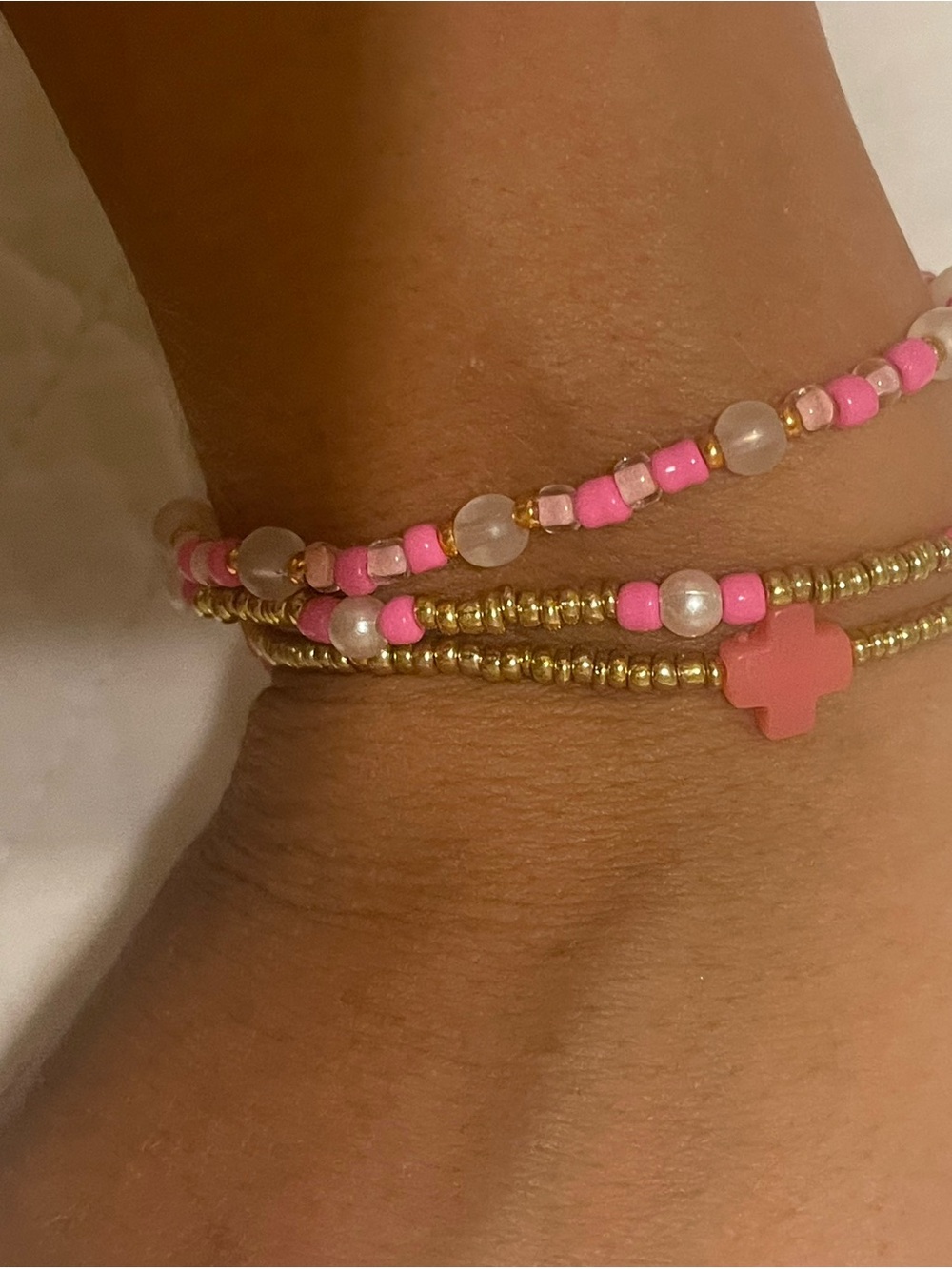 SET OF 3 gold, pearl, pink bracelet with a enewton cross.